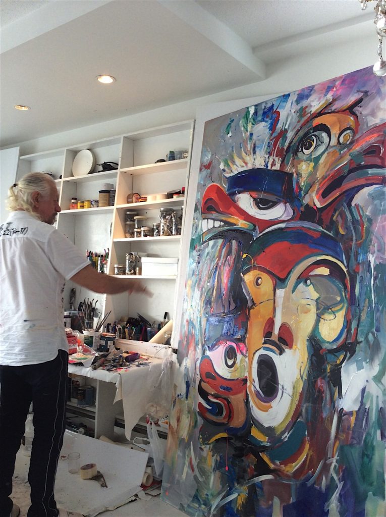 artist painting in studio — Eagle Spirit Gallery Representing Paul’s Native Work
