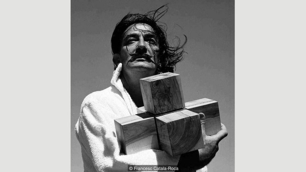 salvador-dali-holding-cross